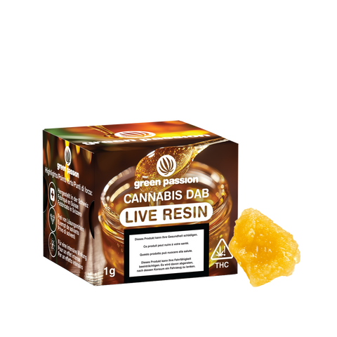 Verpackung von CBD Dabs Live Resin mit einem Stück goldenem Harz daneben, präsentiert im Online-Shop.