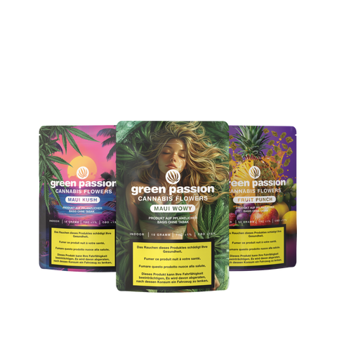 Drei bunte Verpackungen des „CBD Blüten - Tropical-Set“ mit tropischen Motiven und Sortenbeschriftungen, darunter „Maui Kush“ und „Fruit Punch“.