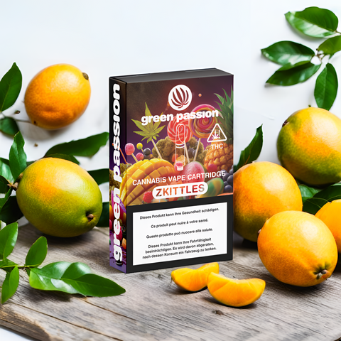 CBD Vape Cartridge Zkittles von Green Passion im stimmungsvollen Setting mit Mango & Zitrusfrüchten – online kaufen bei Green Passion Schweiz