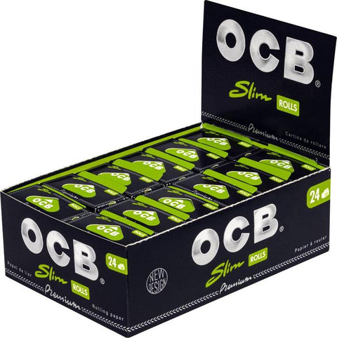 OCB Black Rolls Slim Displaybox mit 24 Packungen, schwarz-grünem Design, zeigt Premium-Zigarettenpapier für individuelles Rollen.