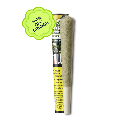 Green Passion Pre-Roll "CBD Crunch" – fertig gedrehter CBD-Joint mit gelber Crunch-Verpackung, Indoor, THC <1%. Badge: "100% CBD Crunch".