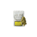Verpackung von Green Passion Cannabis Flowers White Passion mit sichtbarer Blüte daneben.