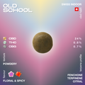 Round piece of CBD hash labeled 'Old School' with a powdery texture. Contains 24% CBD, 0.8% THC, and 0.7% CBG. Flavor is floral and spicy with terpenes like fenchone, terpinene, and citral.