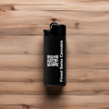 Green Passion Bic lighter with QR code on wooden table – Discover the finest Swiss cannabis accessories