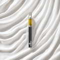 CBD Vape-Set with a black pen and yellow tank on a white, wavy background, ideal for Cookies flavor.