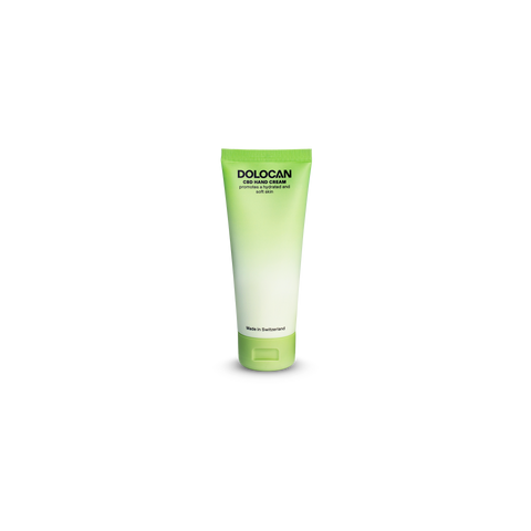 Grüne Tube der DOLOCAN CBD Hand Cream mit der Aufschrift 'promotes soft, hydrated and soft skin', hergestellt in der Schweiz.