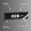 OCB Black Premium Papers Slim avec filtre, montre un paquet de 32 feuilles ultra fines et de tips filtres blancs, idéal pour profiter du roulage King Size.