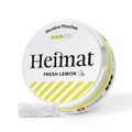 Dose der Heimat Nicotine Pouches Fresh Lemon, mit frischem Zitronendesign und einem weißen Nikotinbeutel im Vordergrund.