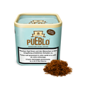 Pueblo Blue Boîte de tabac à rouler avec mention "Sans additifs" ; à côté, une portion de tabac visible.