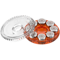 Magasin de capsules doseuses transparent et orange de Storz & Bickel avec huit capsules, ouvert et visible pour une utilisation facile.