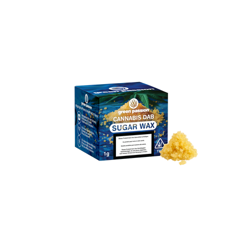 A package of Green Passion Sugar Wax, 1g, with a cannabis dab label and the product visible next to it.